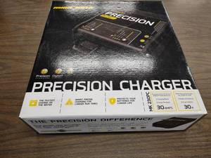 lot 102 image: Minn Kota MK230PC Precision Charger...