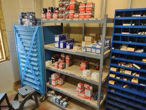 lot 242 image: Shelf Unit with Oil Filters...
