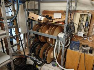 lot 245 image: Shelf Unit with Assorted Hoses...