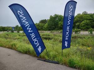lot 313 image: (2) Banners with Stake Stands...