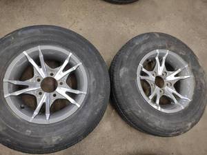 lot 280 image: (2) Aluminum Rims with Tires, ST185...