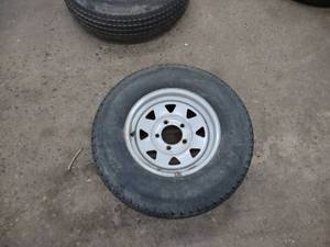 lot 290 image: Rim with Tire, ST18580D13...