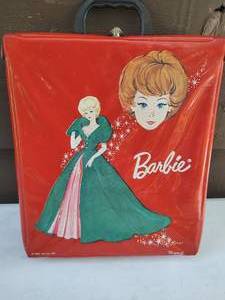 lot 11 image: Red Barbie Case with One Mattel Barbie Doll