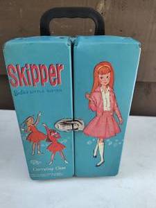 lot 12 image: Blue Skipper Barbies Little Sister Carrying Case with Two Mattel Dolls