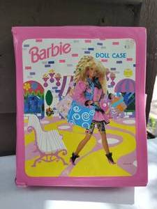 lot 24 image: Pink Barbie Case with Two Mattel Barbie Dolls