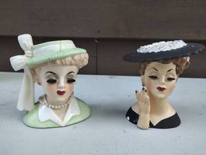 lot 35 image: Two Vintage Lady Head Vases