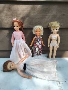lot 44 image: Collection of Four Dolls