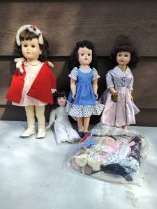 lot 46 image: Collection of Four Dolls with Clothing and Accessories