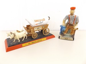 lot 52 image: 2 Vintage Jim Beam 100 Month Decanters