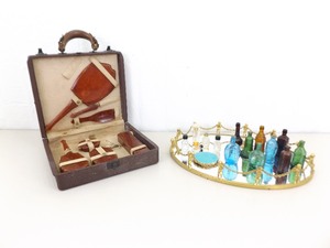 lot 82 image: Vintage Bakelite Vanity Set, Dresser Mirror, Perfume and Elixir Bottles