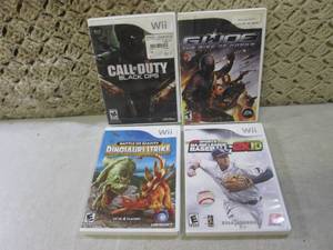 lot 162 image: (EC1) 4 Wii Games...