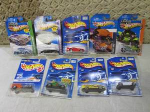lot 234 image: (C-4) Assorted Hot Wheels in Packag...