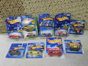 lot 235 image: (C-4) Assorted Hot Wheels in Packag...