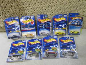 lot 236 image: (C-4) Assorted Hot Wheels in Packag...