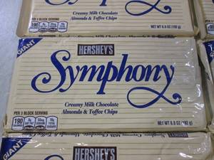 lot 256 image: (B-1) 6 Giant Hersheys Symphony Can...