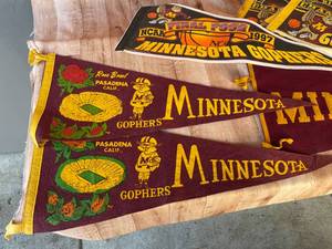 lot 258 image: Vintage U of M Pendants