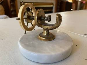 lot 400 image: Marble Stand Brass Nutcracker