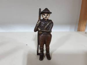 lot 10 image: Vintage Cast Iron Boy Scout With Scarf Still Bank 5-12