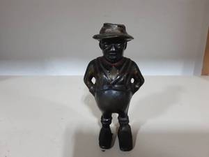 lot 16 image: Vintage Cast Iron Darkey Sharecropper Still Bank 5-14