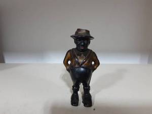 lot 17 image: Vintage Cast Iron Darkey Sharecropper Still Bank 5-14