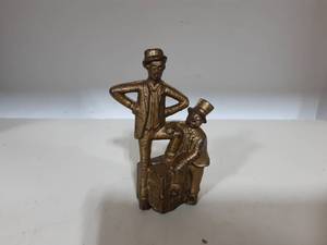 lot 18 image: Vintage Cast Iron Mutt & Jeff Still Bank 5