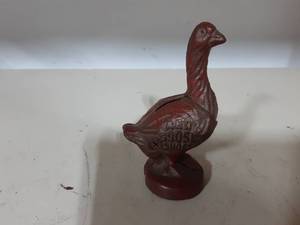 lot 33 image: Vintage Cast Iron Red Goose Shoes Still Bank 2-12x4-12