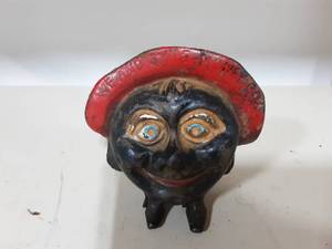lot 34 image: Vintage Cast Iron Save And Smile Money Box Still Bank 4-14x4