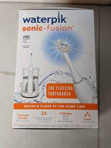 lot 182 image: Waterpik Sonic-Fusion Professional Flossing Toothbrush with 2 Replacement Floss Heads