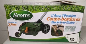 lot 8 image: Scotts 8 11-Amp Corded Electric Lawn Edger