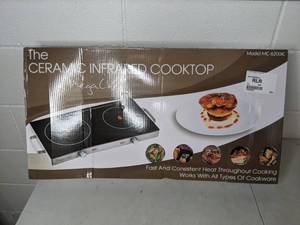 lot 94 image: MegaChef Ceramic Infrared Double Electric Cooktop