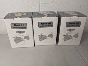 lot 130 image: Set of (3) Cute Elf Star Projection Lamps