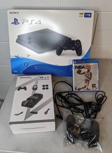 lot 528 image: PlayStation 4 1TB Console, Gamefitz 10 in 1 Accessories pack, &  Lillard NBA2K21 Game