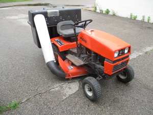 lot 73 image: Ariens Lawn Tractor with attachments