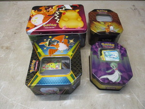 lot 112 image: Lot of 4 Tins of Pokemon Cards