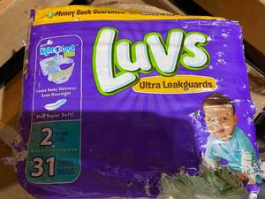 lot 21 image: Around 100 size 2 Luvs diapers some...