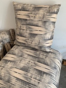 lot 86 image: Oversized Upholstered Ottoman and Three Matching Throw Pillows