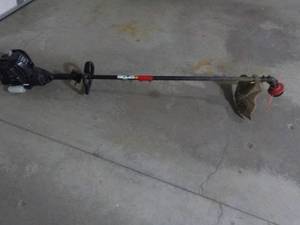lot 114 image: MTD Pro 4 cycle Weed Trimmer...