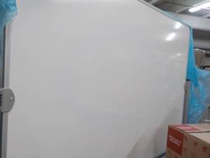 lot 165 image: Mooreco Reversible Mobile Porcelain 4 foot x 6 foot White Board with aluminum frame - Retail $1100  needs assembly