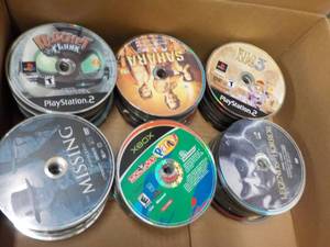 lot 322 image: 300 or so DVDs, CDs, Audio and Ga...
