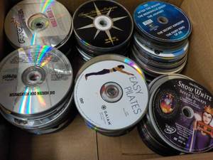 lot 324 image: 350 or so DVDs, CDs Audio and Gam...