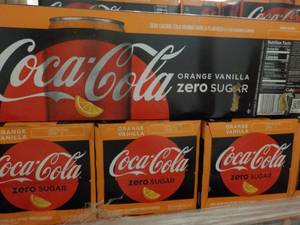 lot 345 image: 4 - 12 packs Coca Cola Orange Vanil...