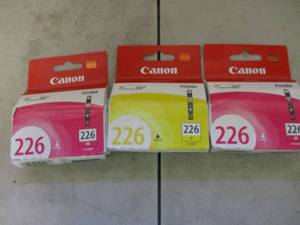 lot 67 image: 3 Canon Ink Tanks...