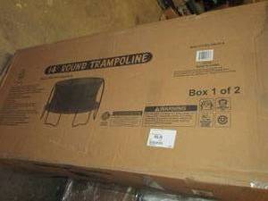lot 34 image: 14 foot trampoline and 14 foot encl...