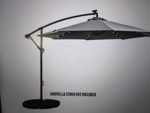lot 144 image: sunray 10 ft offset solar lighted u...