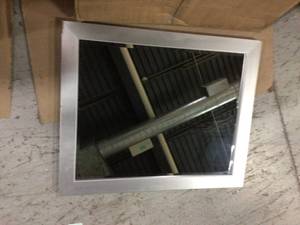 lot 48 image: Brushed 32 in. W x 26 in. H Framed Rectangular Bathroom Vanity Mirror in Brushed Silver Customer Returns See Pictures