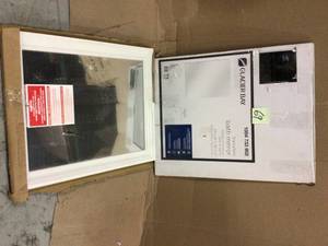 lot 69 image: Glacier Bay 24 in. W x 30 in. H Frameless Rectangular Bathroom Vanity Mirror in Silver Customer Returns See Pictures