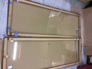 lot 85 image: 53 in. x 80 in. Frameless Hinged Reversible Shower Door Customer Returns See Pictures