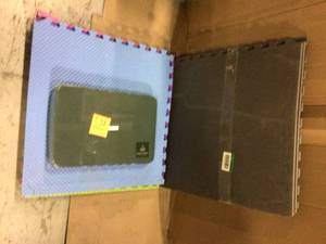 TrafficMaster Black 25.2 in. x 25.2 in. x 0.68 in. Foam Shock Absorbing Gym Floor (17.64 sq. ft.) (4-Pack) Customer Returns See Pictures&nbsp