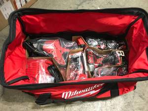 lot 4 image: Milwaukee Milwaukee 2695-24 18V M18 Lithium-Ion Cordless 4-Tool Combo Kit  not used see pictures