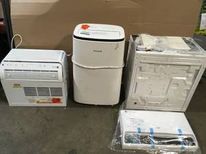 lot 20 image: Lot of assorted Air Conditioners various models and conditions see pictures